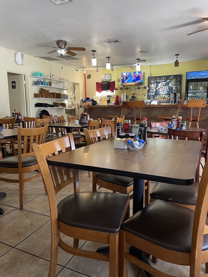 Casual restaurant interior with warm lighting.