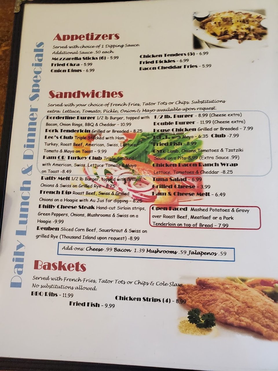 Menu board with breakfast plates and omelets.